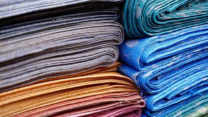 Colorful high-quality fabric samples by Kozanteks, a dedicated clothing manufacturer.