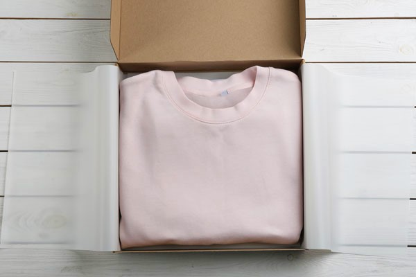 Neatly folded and packaged high-quality shirt ready for wholesale distribution.