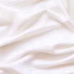Soft organic fabric with a smooth texture.